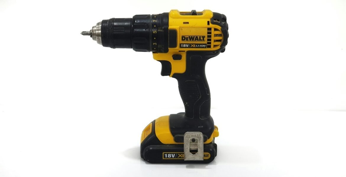 Power drill and DIY tools on workbench